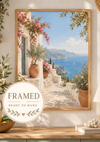 Mediterranean coastal scene with pink bougainvillea, whitewashed walls, terracotta pots and blue sea; framed and ready to hang badge