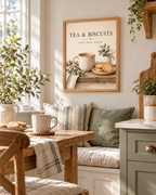Tea and Biscuits quote, brew dunk unwind, with speckled ceramic mug, biscuits, sage foliage and cream background styled in a breakfast nook