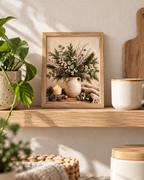 Winter botanical still life with evergreen foliage, eucalyptus, white berries and pine cones in a rustic jug, candle, brass bells and knitted blanket styled in a shelf