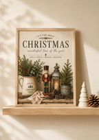 Rustic Christmas nutcracker, evergreen foliage, red berries and candlelit lantern beneath vintage Christmas typography styled in a shelf display