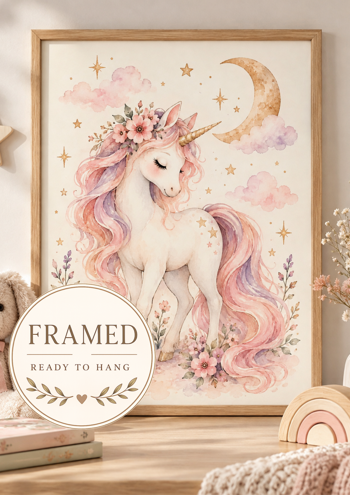 Pink and lilac watercolour unicorn with floral crown, golden crescent moon and stars; framed and ready to hang badge