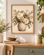 Cream floral bouquet artwork above a sage kitchen counter
