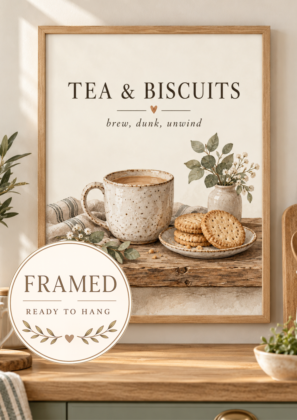 Tea and Biscuits quote, brew dunk unwind, with speckled ceramic mug, biscuits, sage foliage and cream background; framed and ready to hang badge