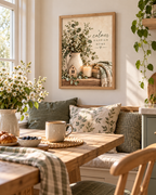 A calmer happier home botanical artwork with eucalyptus, white wildflowers, rustic jug, candle, wooden house and knitted blanket styled in a breakfast nook