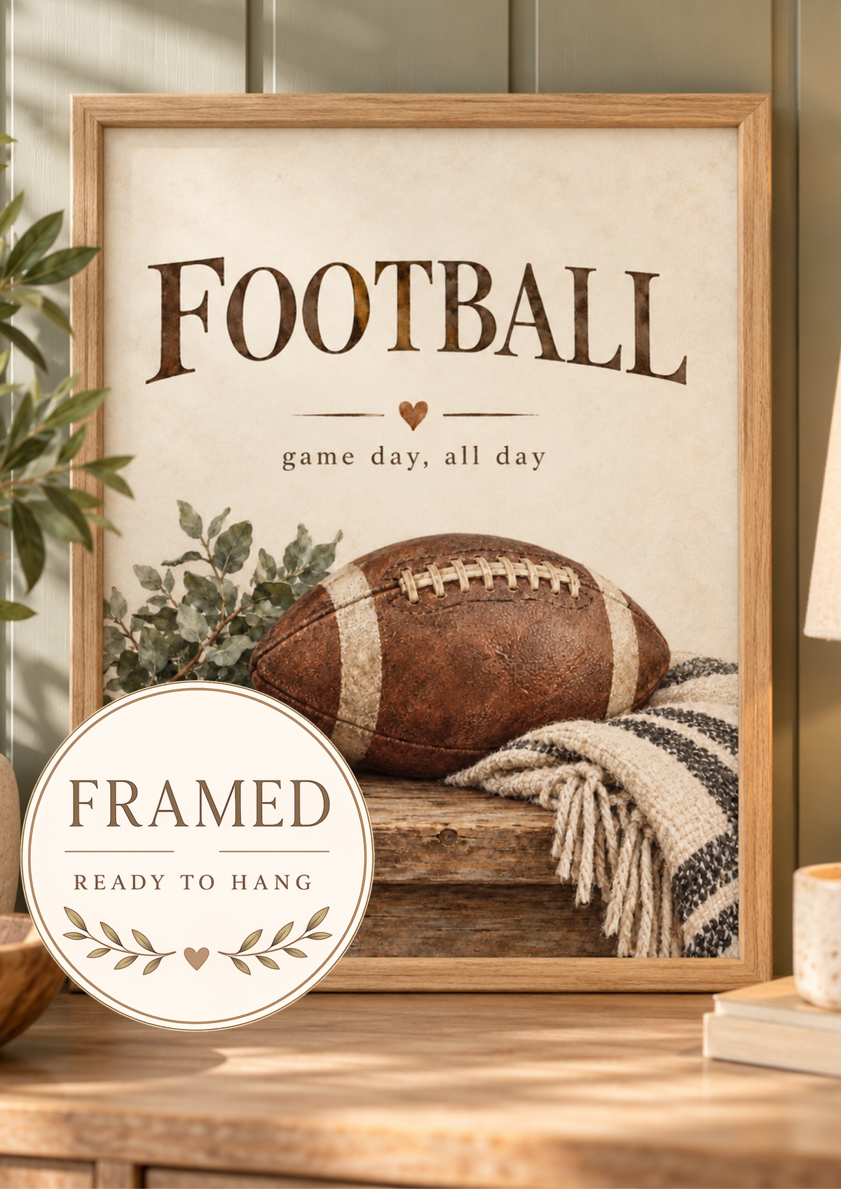 Vintage American football with game day all day wording, greenery and knitted textures; framed and ready to hang badge
