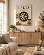 Vintage dartboard with Darts and aim, throw, repeat wording, rustic wood and greenery styled in a living room
