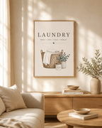 Laundry basket with folded linens, foliage and wash dry fold repeat lettering styled in a living room