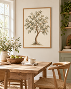 Watercolour botanical tree with sage green leaves, ivory white blossoms and a curved natural trunk on warm ivory styled in a dining area