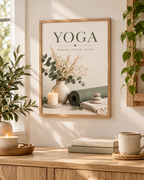 Yoga breathe stretch restore artwork with sage green yoga mat, eucalyptus, dried flowers, candle and stacked stones styled in a sideboard