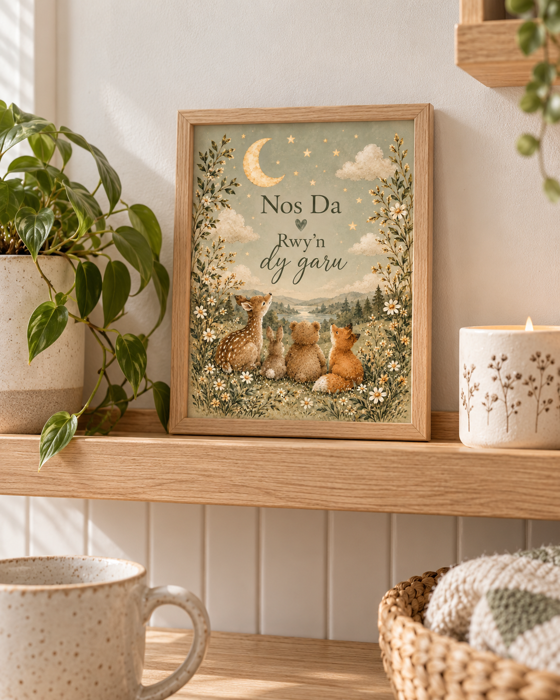 Nos Da Rwyn dy garu Welsh goodnight quote with deer, rabbit, bear and fox beneath a crescent moon and stars styled in a shelf display