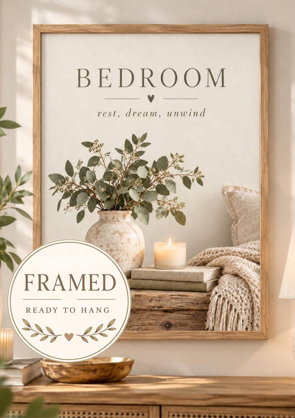 Bedroom rest dream unwind botanical artwork with eucalyptus, ceramic vase, candle, books and knitted blanket; framed and ready to hang badge