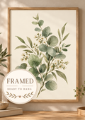 Sage green eucalyptus and delicate white blossom botanical watercolour against a warm cream background; framed and ready to hang badge