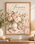 Forever Starts Here wedding artwork with blush and ivory roses, muted green foliage, champagne glasses, engagement ring, ribbons and wedding stationery; print only, frame not included