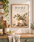 Home quote artwork above a sage kitchen counter