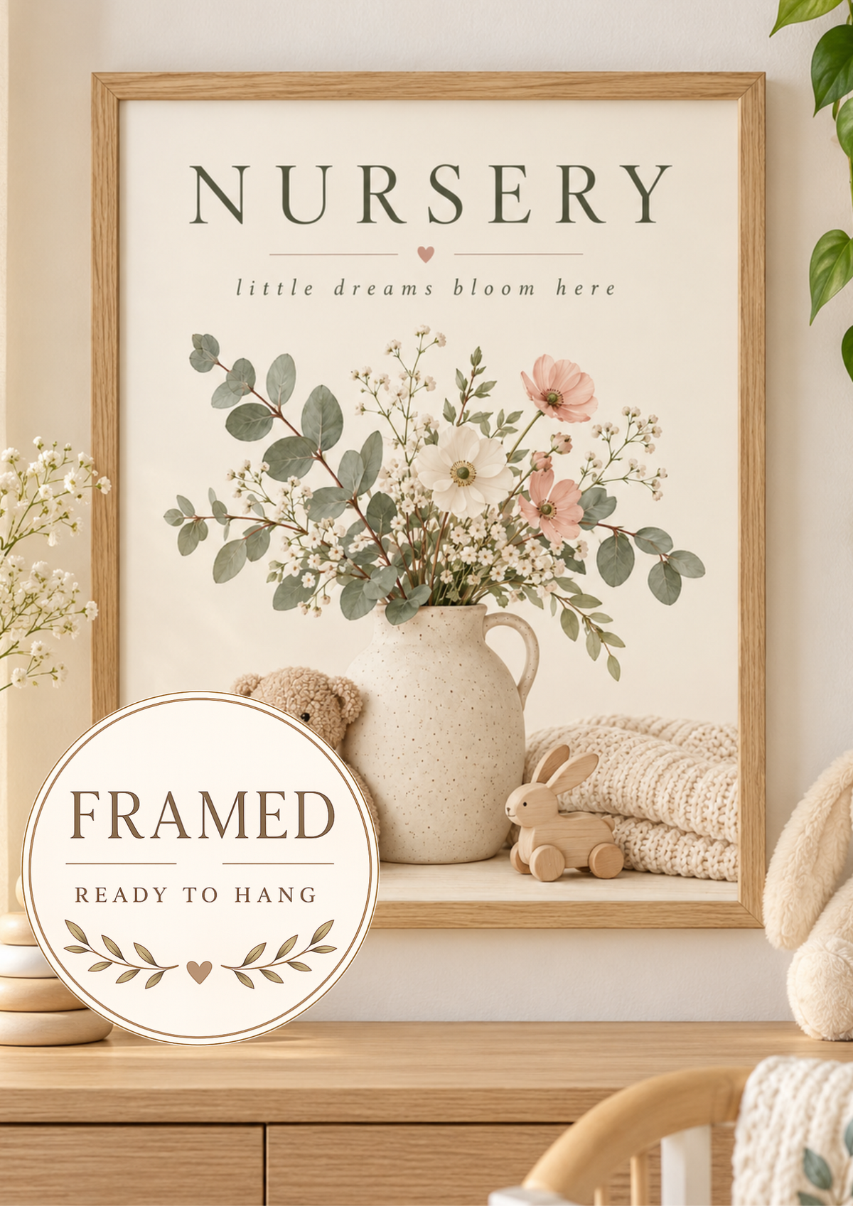 NURSERY little dreams bloom here artwork with cream and blush flowers, sage foliage, ceramic jug, teddy bear, wooden bunny and knitted blanket; framed and ready to hang badge