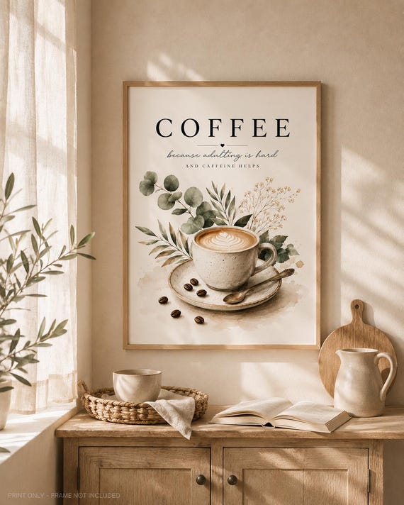 Framed neutral coffee artwork in a cosy Scandinavian-style interior