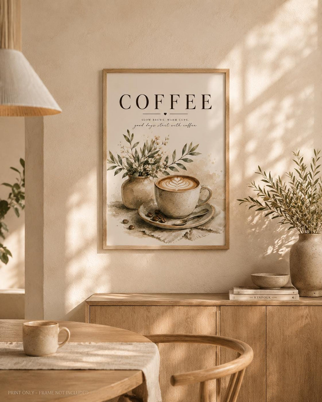Framed coffee wall art styled in a neutral kitchen