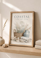 Framed seaside still life print in coastal interior