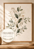 Neutral botanical leaves and delicate stems with beige berries on a warm cream background; framed and ready to hang badge