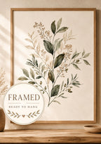 Neutral botanical leaves and delicate stems with beige berries on a warm cream background; framed and ready to hang badge