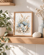 Coastal seashell artwork styled on a wooden shelf with seashell ornaments